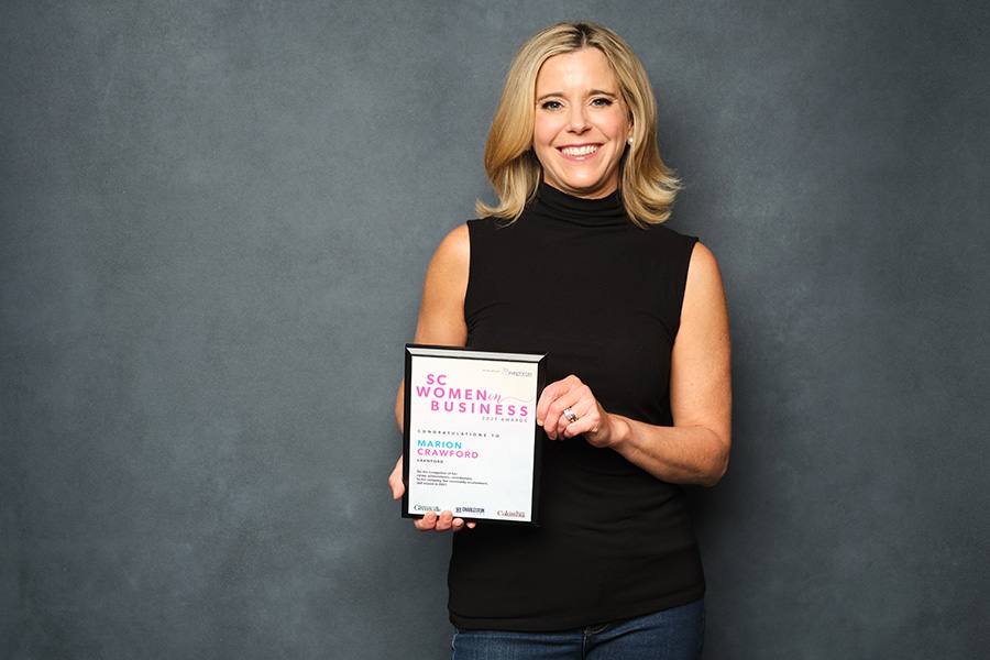 Marion Crawford holding SC Women in Business award